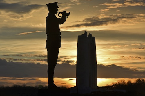 November 11: sunrise looking down view corridor captures the Memorial and
Bugler statue.
